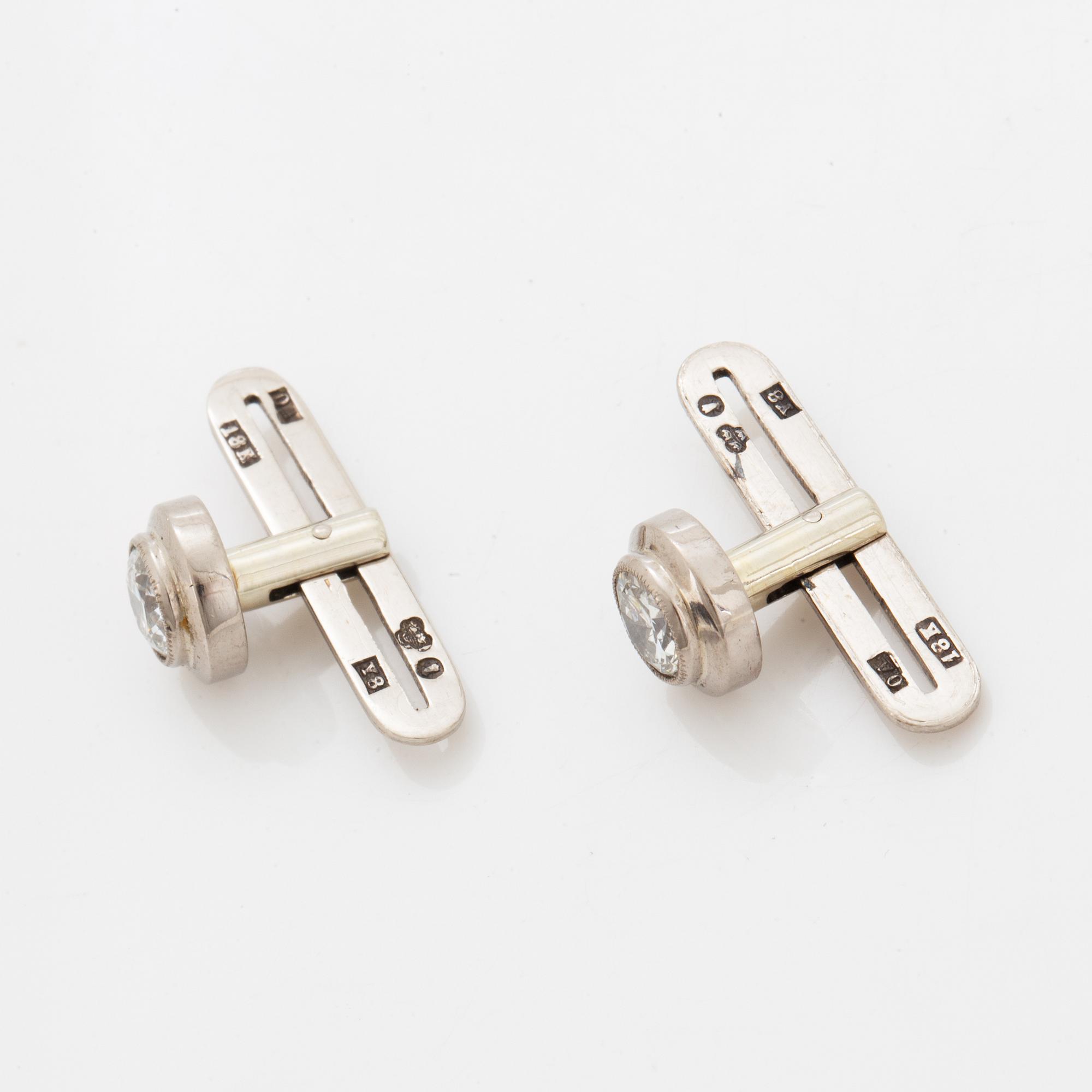 Brilliant-cut diamond shirt buttons.