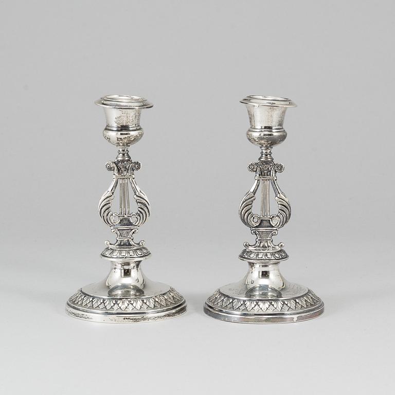 A pair of silver candlesticks by GAB, Stockholm, 1909.