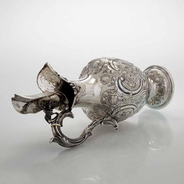 A sterling silver jug, maker's mark of Martin, Hall & Co, Sheffield 1877.