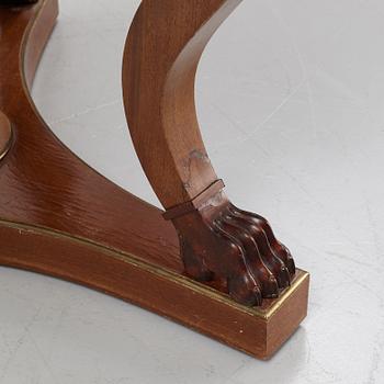 A mahogany veneered Empire style table, first half the 20th Century.