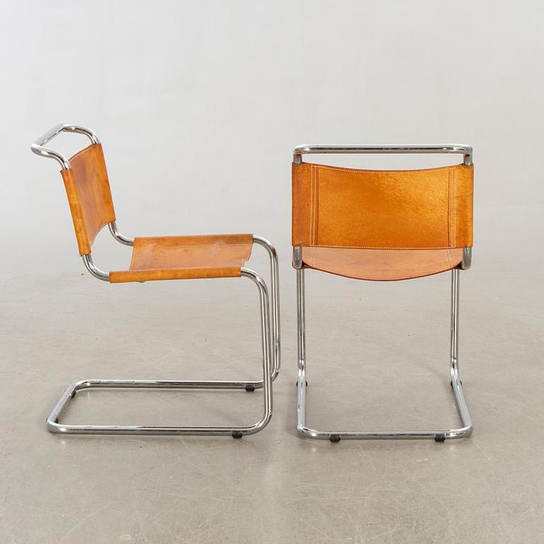 A pair of Italian chairs later part of the 20th century.