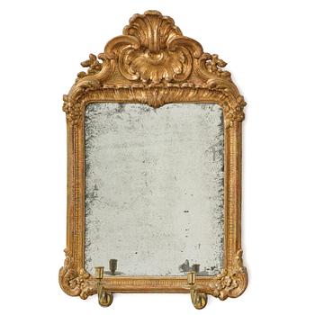 236. A two-branch giltwood rococo girandole mirror, Stockholm, later part 18th century.