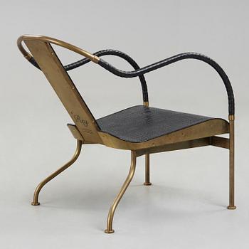 A Mats Theselius brass and black leather 'El Rey' easy chair, Källemo, Sweden 1999.