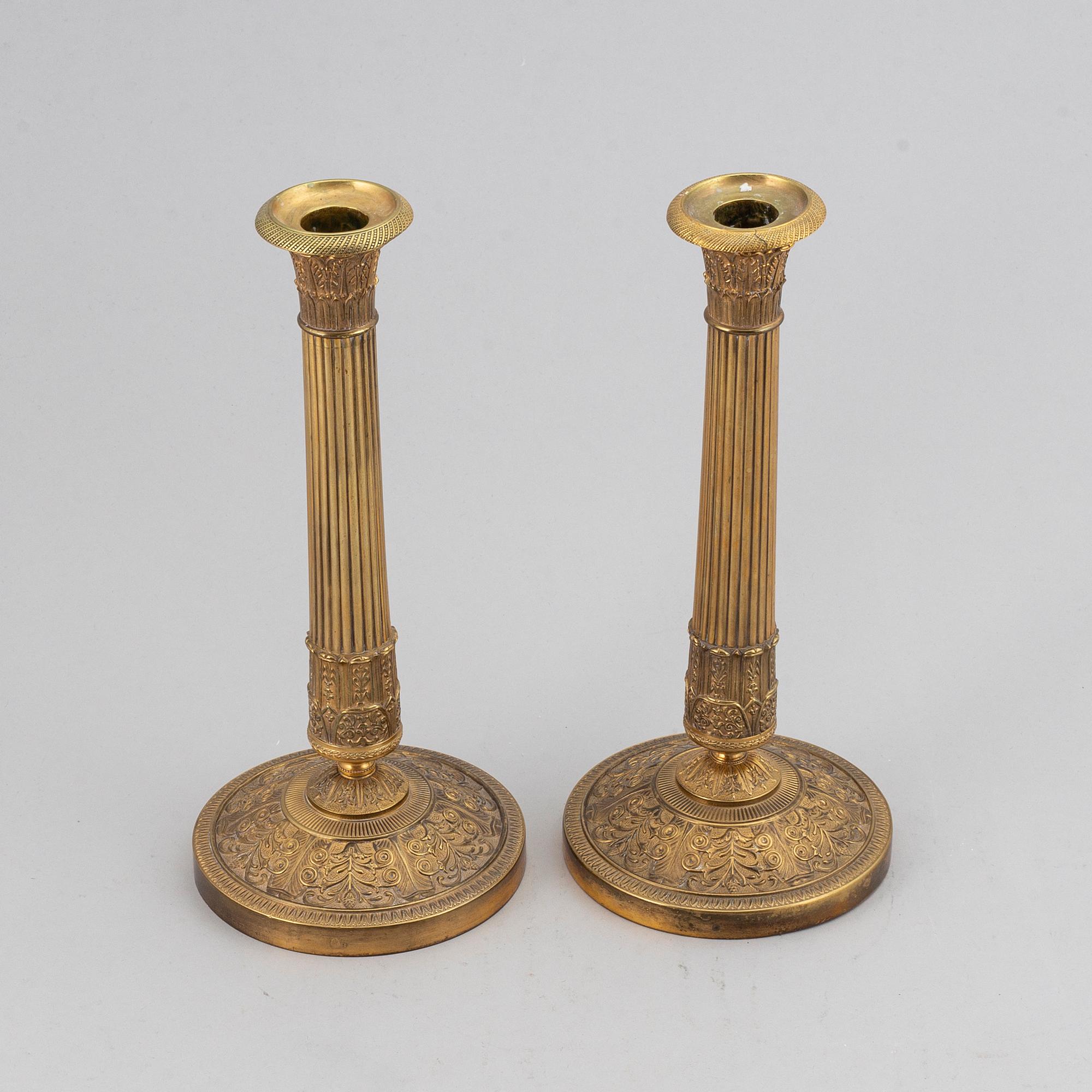 A pair of candlesticks, empire style.