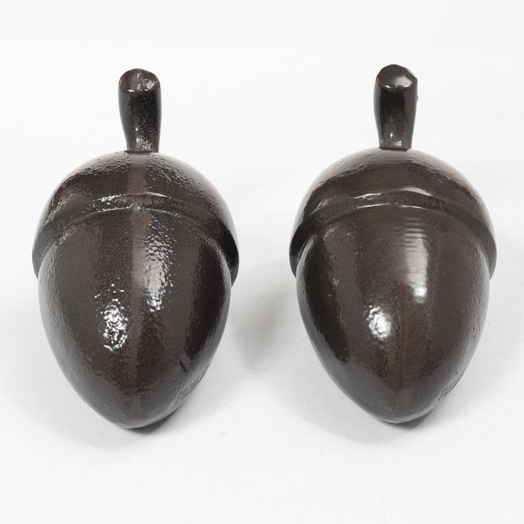 Eva Schildt and Maja Sten, doorstops, a pair, “Ekollon”, Firma Svenskt Tenn.