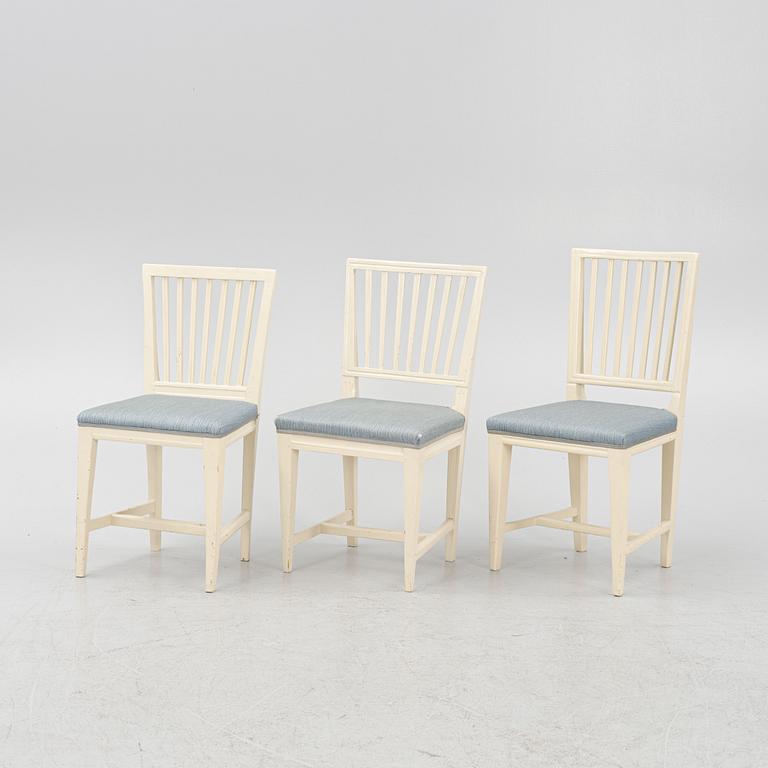 A matched set of 11 painted chairs 18th and 19th century.