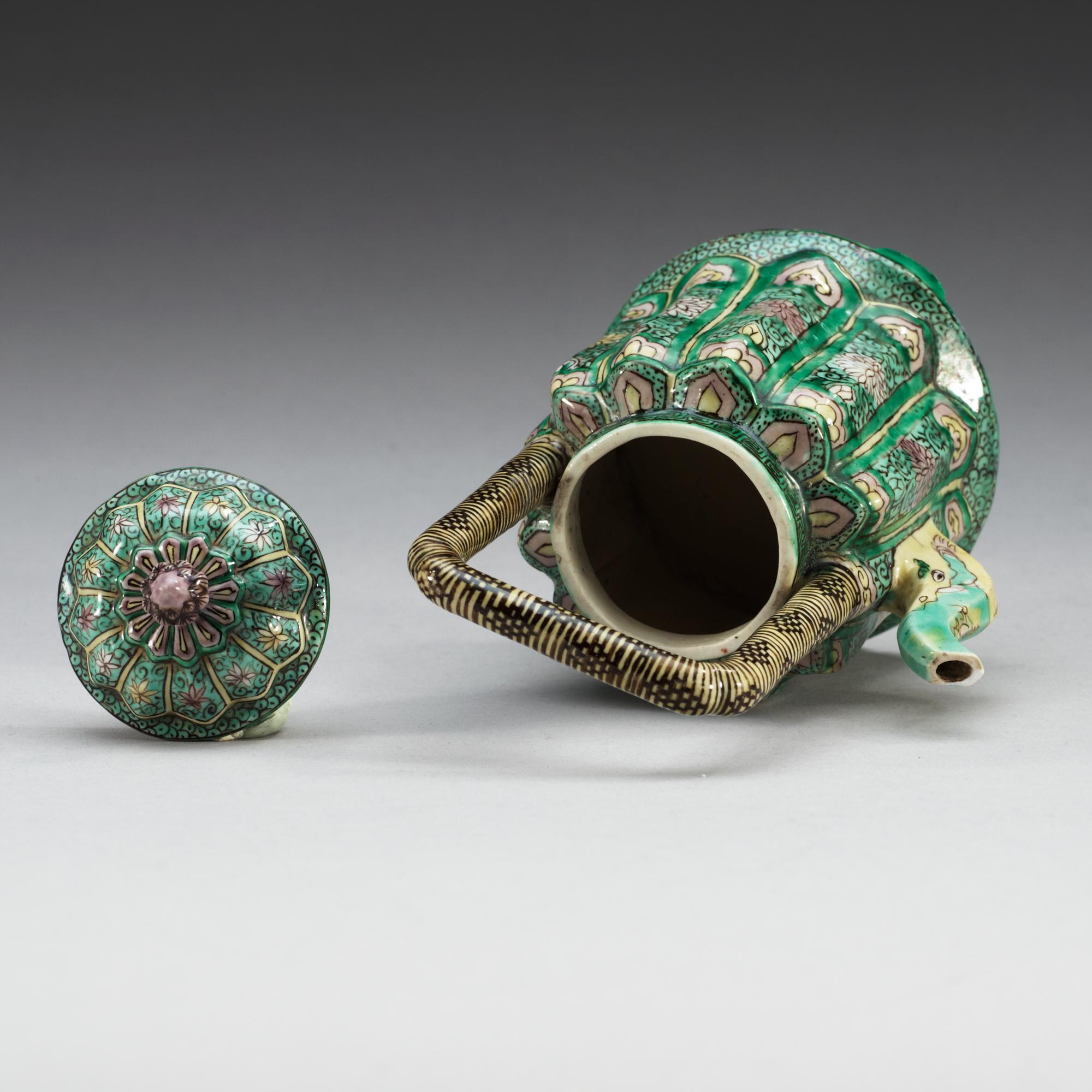 A famille verte biscuit wine-pot and cover, Qing dynasty, Kangxi (1662-1722).