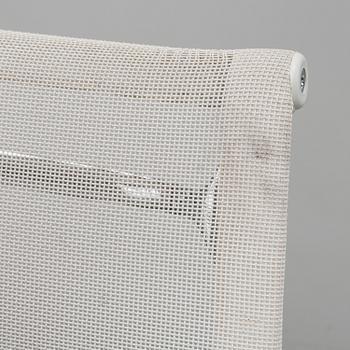 A pair of 'EA 108' desk chairs by Charles & Ray Eames for Vitra.