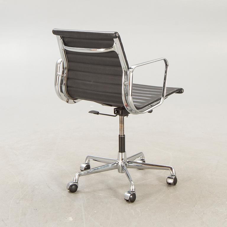 A Charles and Ray Eames "EA 117" office chair from ICF Milano.