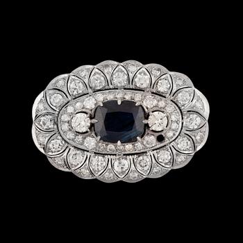 974. BROSCH, gammalslipade diamanter tot. ca 6.50 ct, safir.