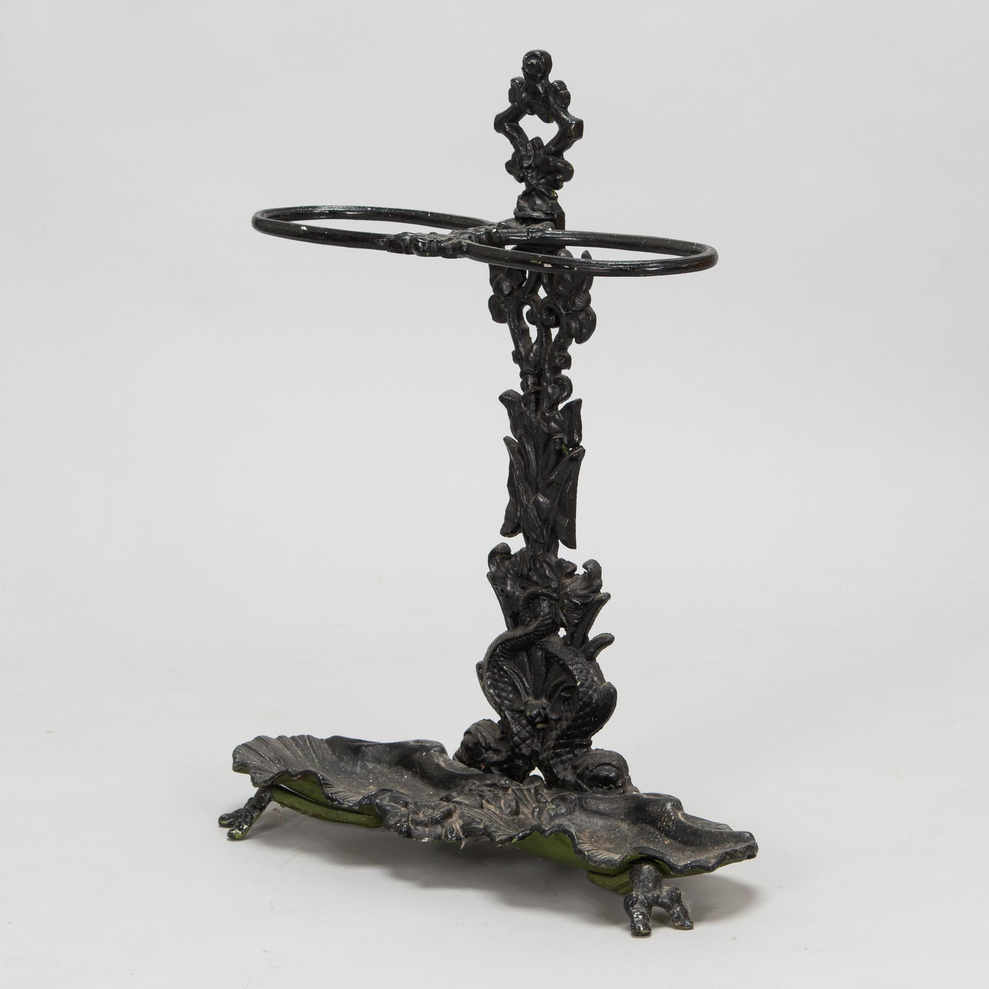 A cast iron umbrella stand, 20th Century.