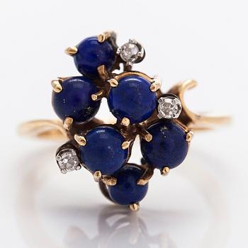 A 14K gold ring, with lapis lazuli and diamonds totalling approx. 0.03 ct.