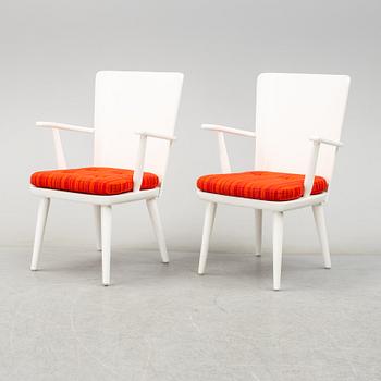 A pair of second half of the 20th century arm chairs by Göran Malmvall.