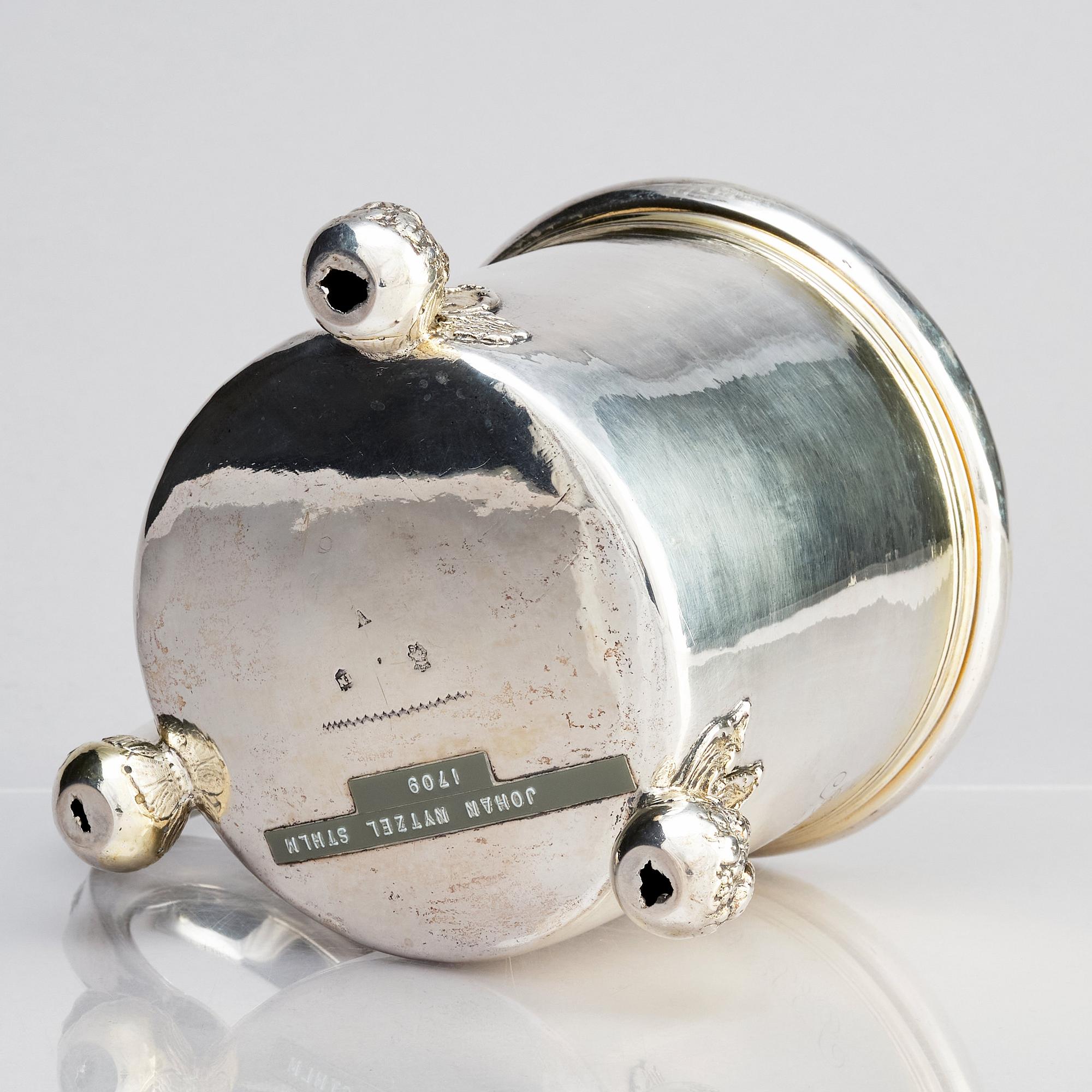 A Swedish 17th century parcel-gilt tankard, mark of Johan Nützel, Stockholm 1708.