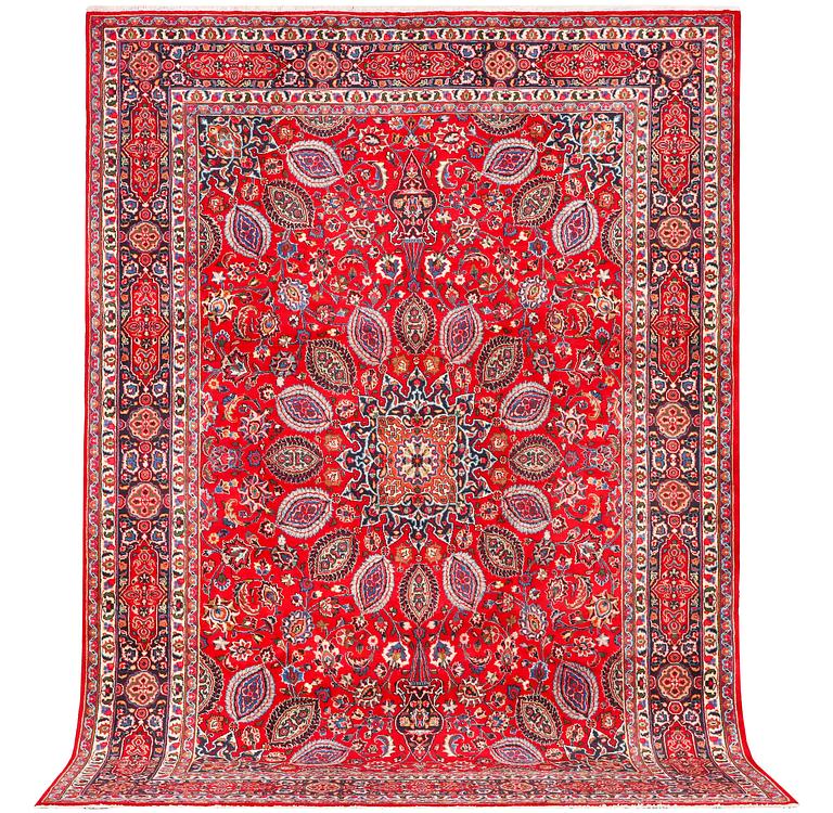 A Keshan carpet, c. 355 x 245 cm.