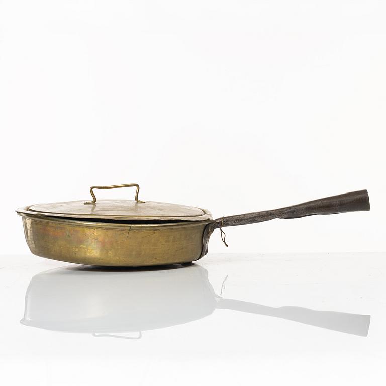 A Swedish brass lidded saucepan, 18th century.