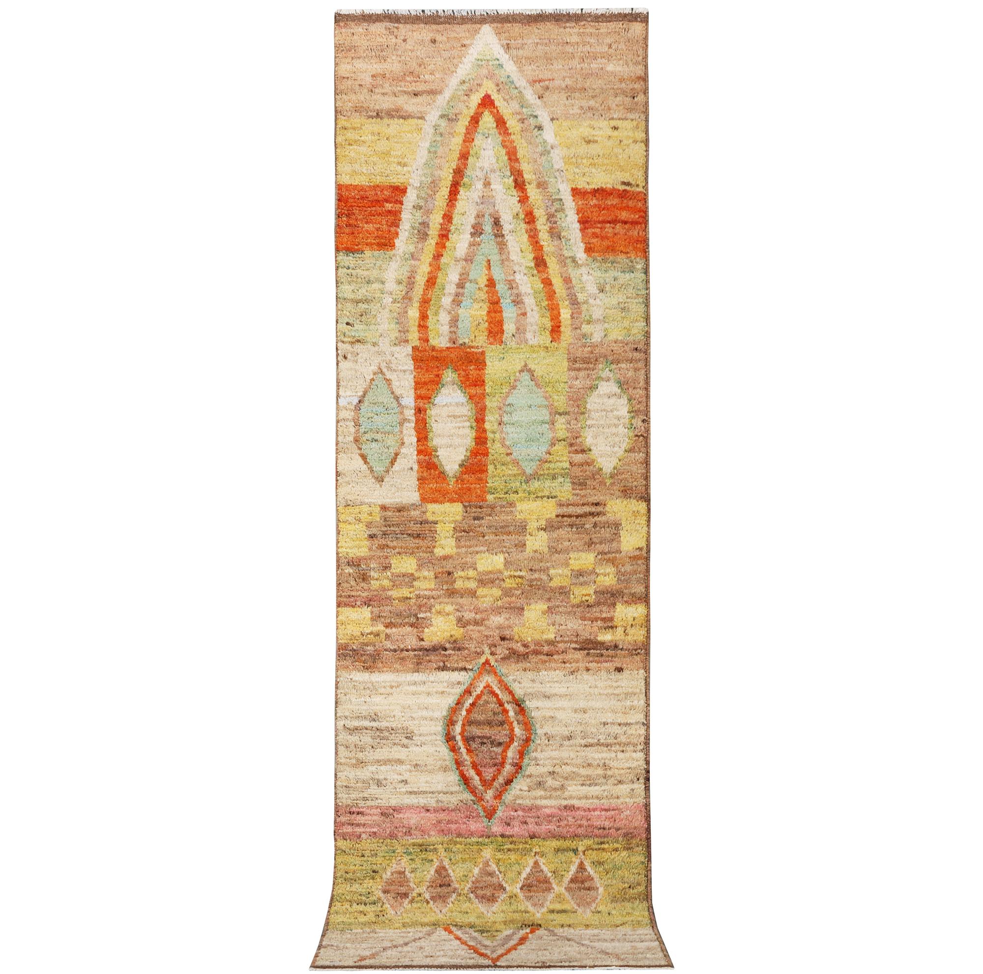 A Moroccan runner carpet, c. 304 x 84 cm.