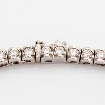 Collier rivière 18K vitguld runda briljantslipade diamanter.