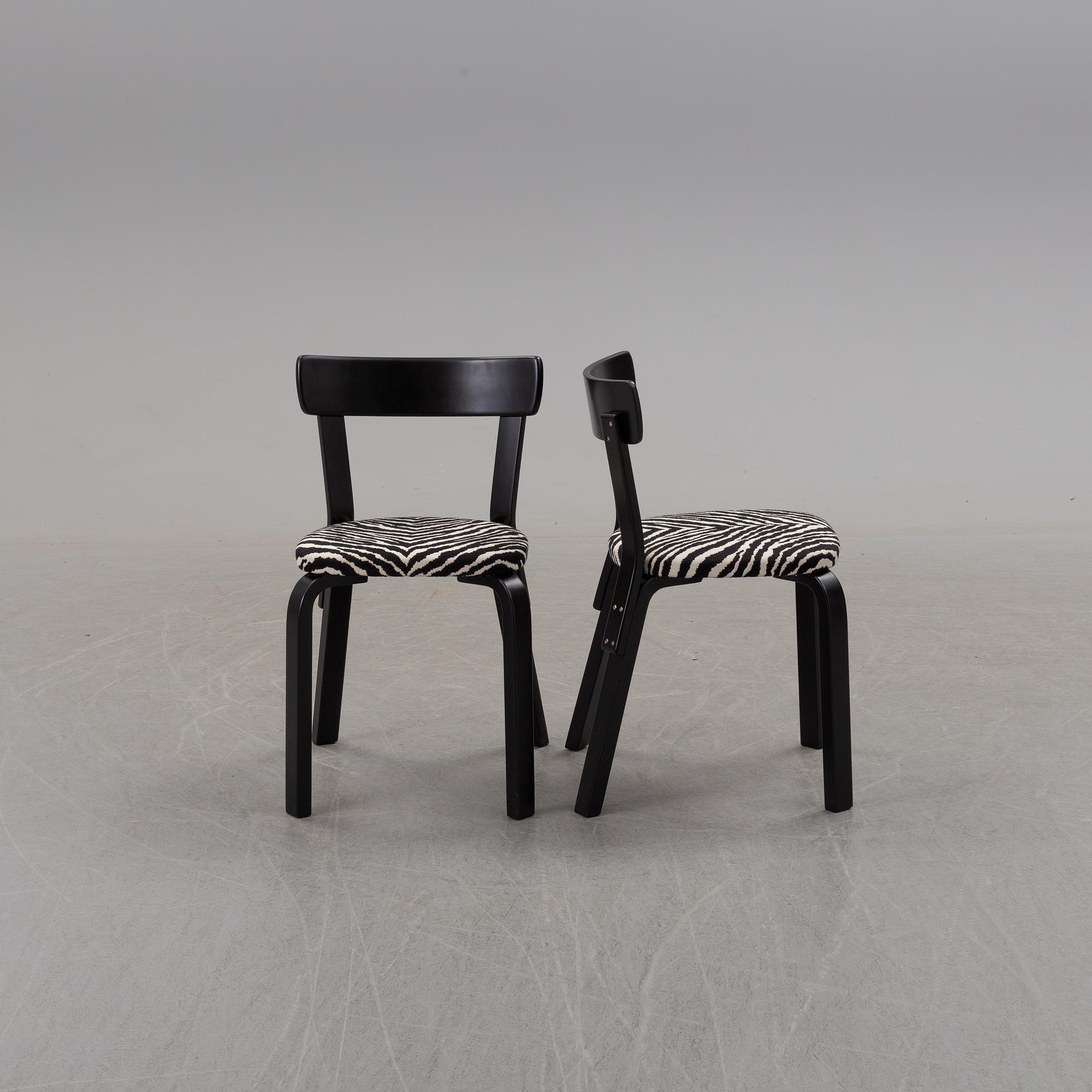 a dining table '81B' and four '69' chairs by Alvar Aalto, Artek.