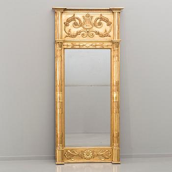 A SWEDISH EMPIRE MIRROR 19TH CENTURY.