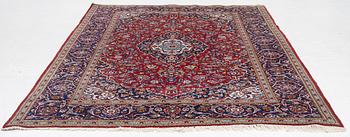 A Kashan carpet, c. 309 x 202 cm.