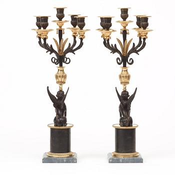 A pair of Russian Louis XVI-style 19th century five-light candelabra.