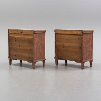 A pair of Gustavian style painted chest of drawers.