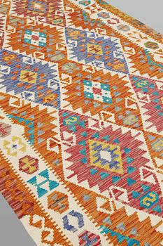 A Kilim runner, classic design, approximately 771 x 127 cm.