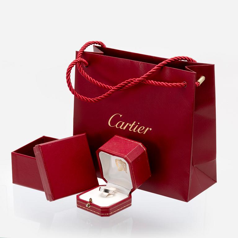 Cartier, ring 18K whitegold approx 0,60 ct approx F-G VS, original case, box and certificate, serial number BAA 730.