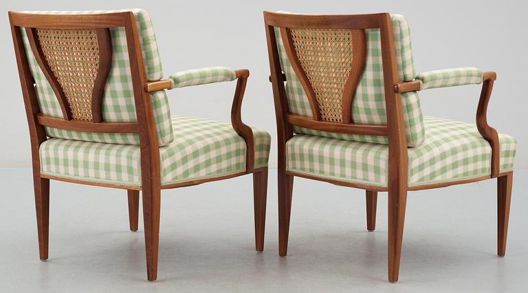 A pair of Josef Frank arm chairs by Firma Svenskt Tenn.