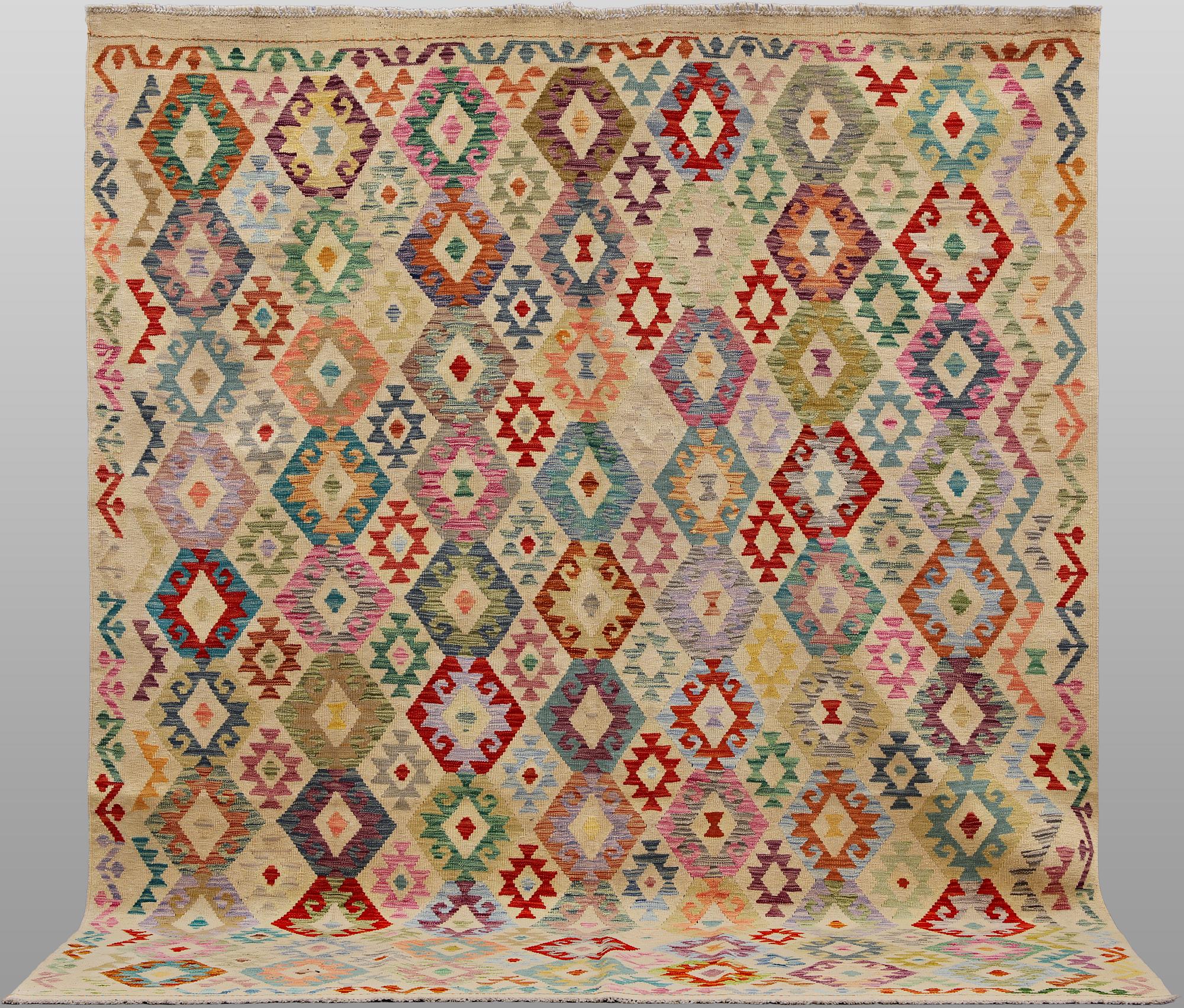 A Kilim rug, approx. 297 x 248 cm.