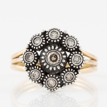 Ring in gold and silver set with octagonal-cut diamonds.