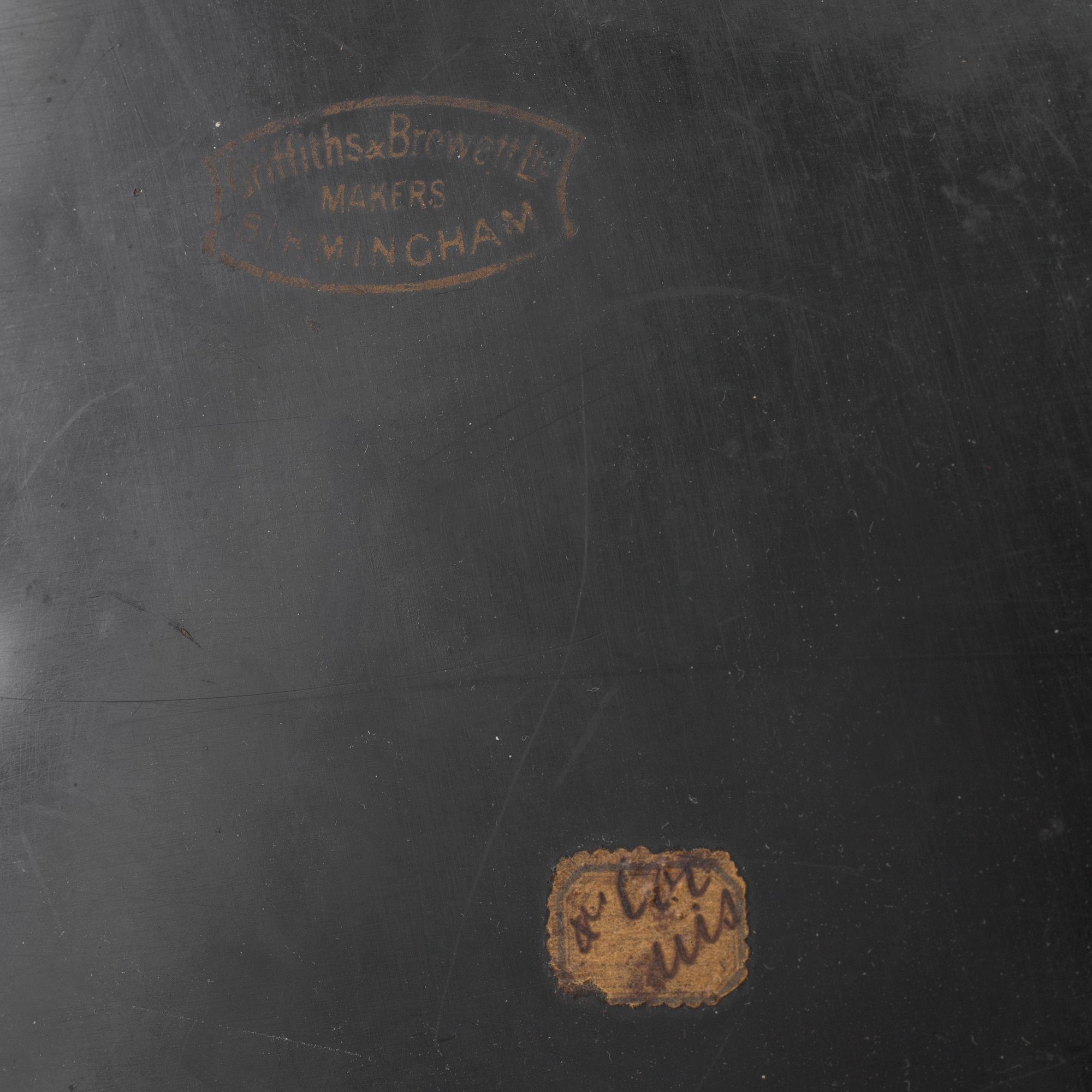 An empire sheet metal tray by Griffith & Browett, Birmingham.