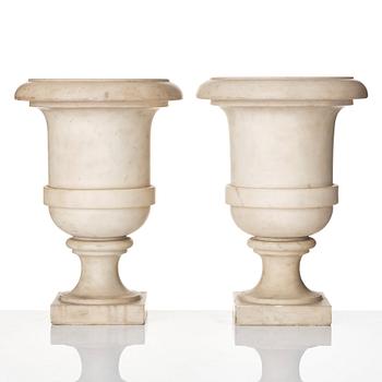 A pair of white marble urns, presumably Italy late 18th century.