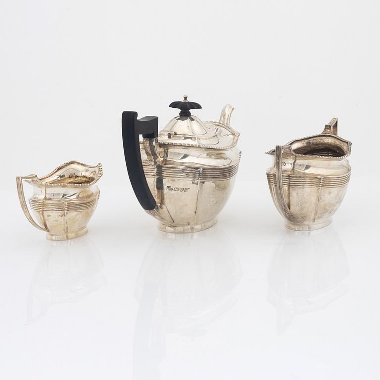 Barker Brothers (Herbert Edward Barker & Frank Ernest Barker), a silver teapot, creamer and sugar bowl, Chester 1924.