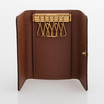 Louis Vuitton, A Monogram 'Victorine' Wallet and Monogram '6 key holder'.