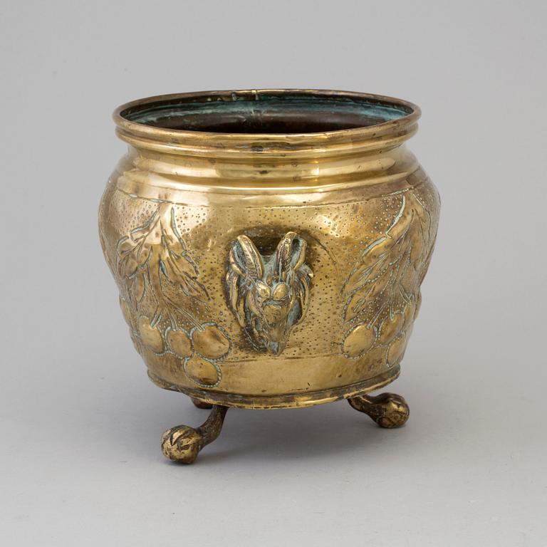 A 19TH CENTURY BRASS FLOWER POT.