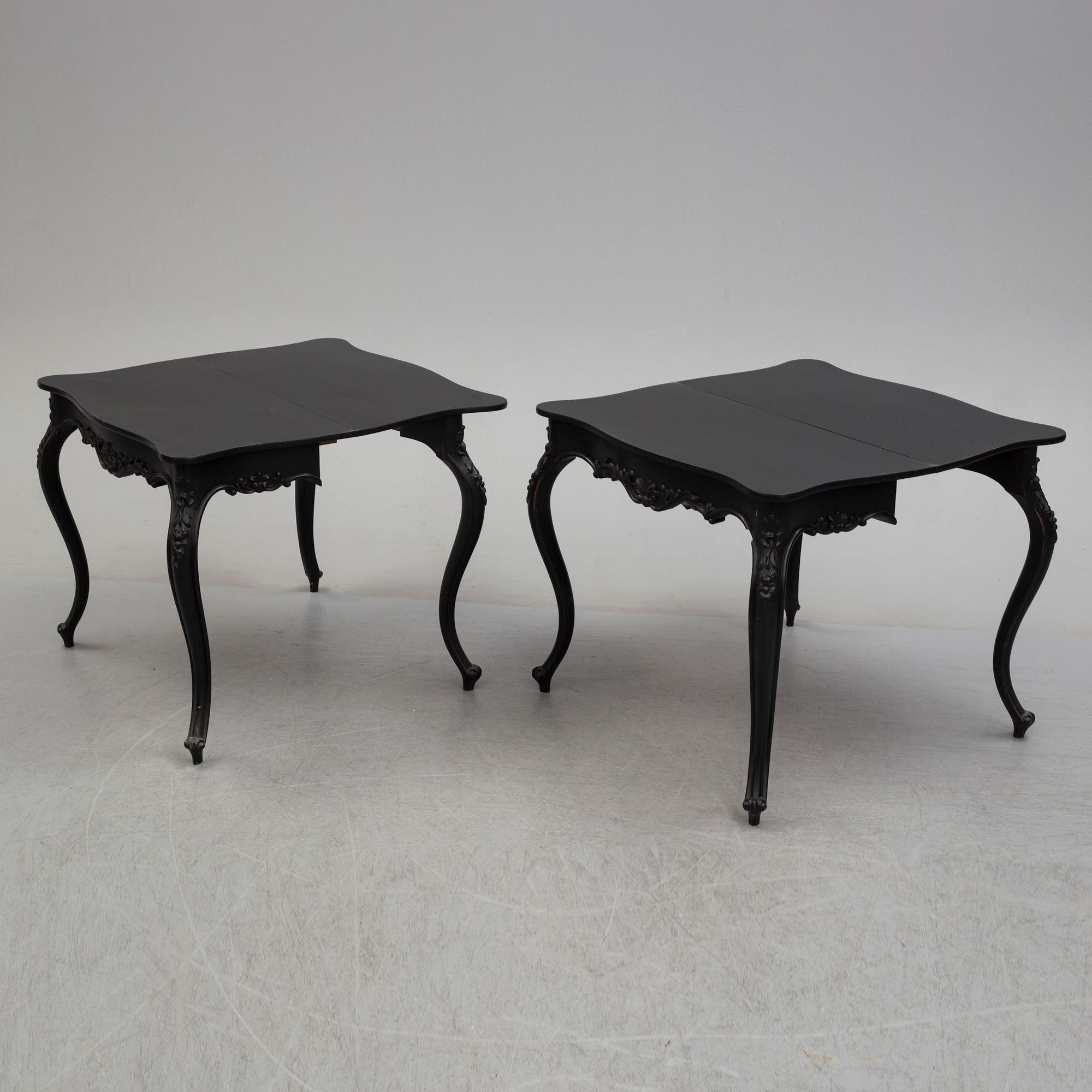 A pair of end of the 19th century new rococo style painted card tables.