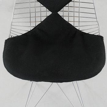 A pair of chairs, "DKR", by Charles & Ray Eames for Herman Miller, USA, around mid 20th century.