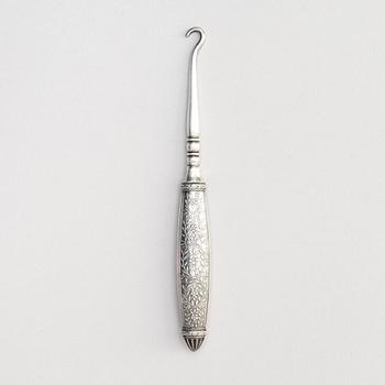 A silver button hook for gloves, W.A. Bolin, Stockholm 1917.
