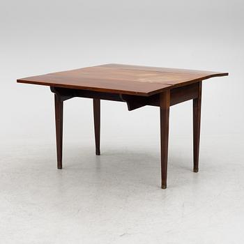 Table with drop leaves, 19th century.