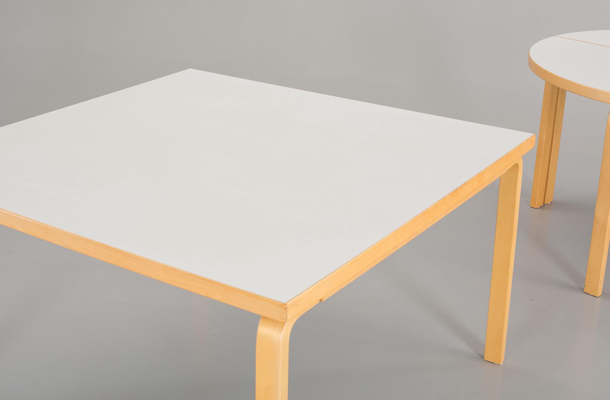 A SET OF 3 PARTS ALVAR AALTO DINING TABLE FROM ARTEK.