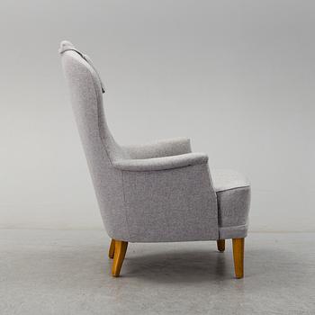 A 'Farmor' easy chair by Carl Malmsten, late 20th century.