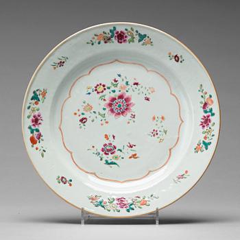 A set of 12 famille rose dinner plates, Qing dynasty, Qianlong (1736-95).