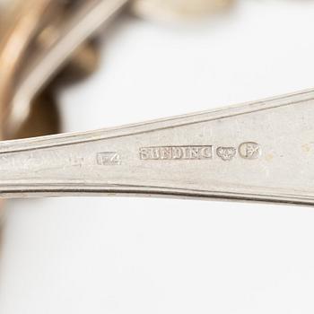 Sixteen silver spoons and seven teaspoons, Sweden, 19th and 20th century.