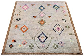 A Moroccan rug, c. 229 x 169 cm.