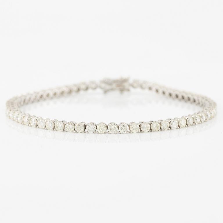 Tennis bracelet 18K white gold with brilliant-cut diamonds.