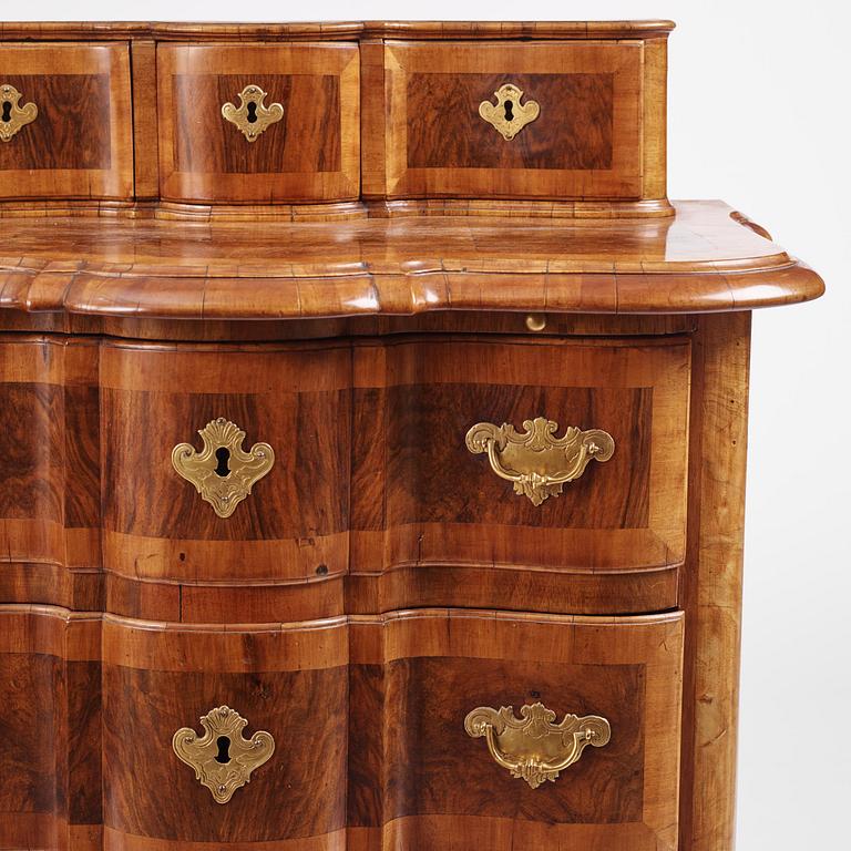 A late Baroque walnut commode by J. H. Fürloh (master in Stockholm 1724-45).