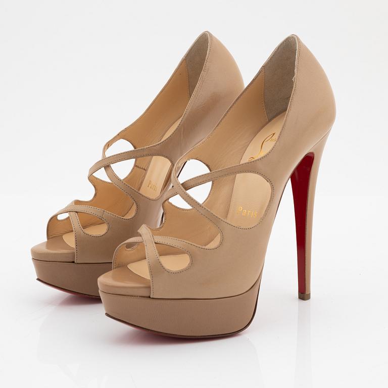 Christian Louboutin, a pair of beige leather sandals, size 37.