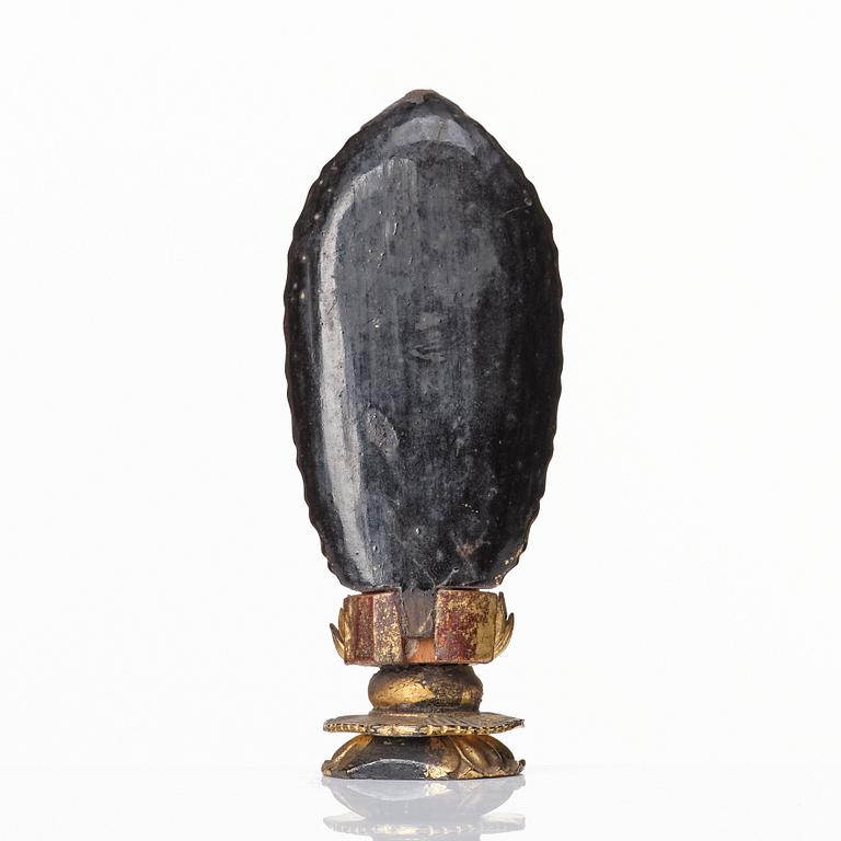 A miniature lacquer Buddha, Tibet/Nepal.